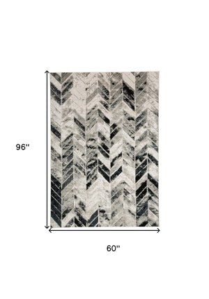HomeRoots 4' Gray and Black Chevron Area Rug - Modern, Durable Design for Living Rooms and Cozy Spaces 5' X 8' 511507