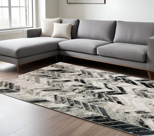 HomeRoots 4' Gray and Black Chevron Area Rug - Modern, Durable Design for Living Rooms and Cozy Spaces 8' X 10' 511508