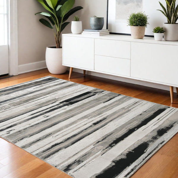 HomeRoots 4' Stylish Black and Silver Abstract Area Rug for Living Rooms, Bedrooms, and Home Offices - Non-Skid 4' X 6' 511518
