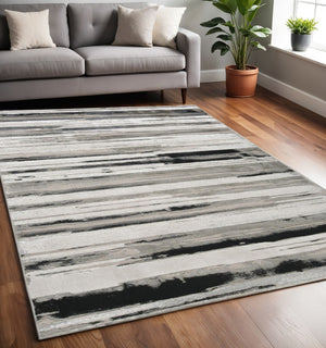 HomeRoots 4' Stylish Black and Silver Abstract Area Rug for Living Rooms, Bedrooms, and Home Offices - Non-Skid 5' X 8' 511519