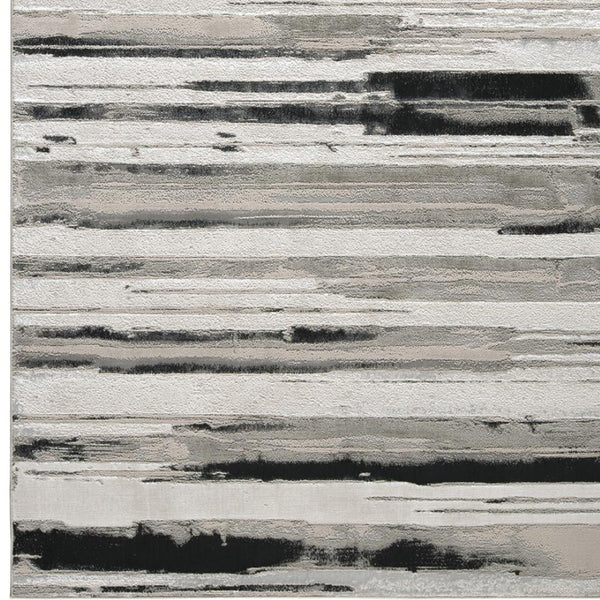 HomeRoots 4' Stylish Black and Silver Abstract Area Rug for Living Rooms, Bedrooms, and Home Offices - Non-Skid 5' X 8' 511519