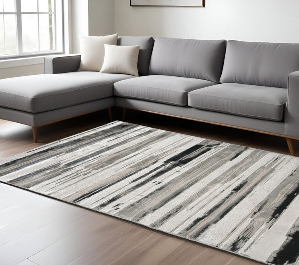 HomeRoots 4' Stylish Black and Silver Abstract Area Rug for Living Rooms, Bedrooms, and Home Offices - Non-Skid 8' X 10' 511520