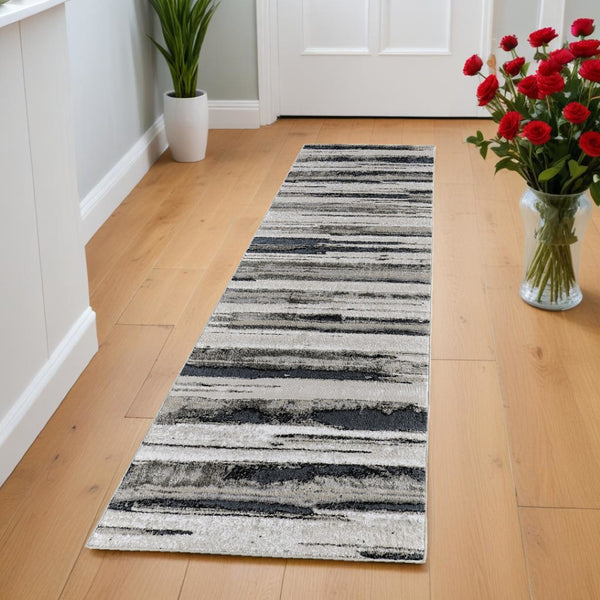 HomeRoots 4' Stylish Black and Silver Abstract Area Rug for Living Rooms, Bedrooms, and Home Offices - Non-Skid 8' Runner 511525