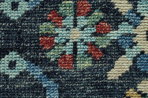 HomeRoots 2' Hand-Knotted Wool Tribal Area Rug in Black, Blue & Orange with Distressed Finish and Fringes 2' X 3' 511628