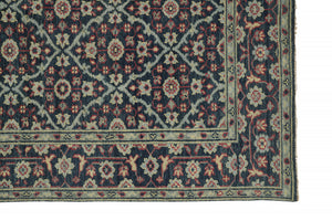 Homeroots 10' X 13' Blue Green And Red Wool Floral Hand Knotted Distressed Stain Resistant Area Rug With Fringe  Wool 511640