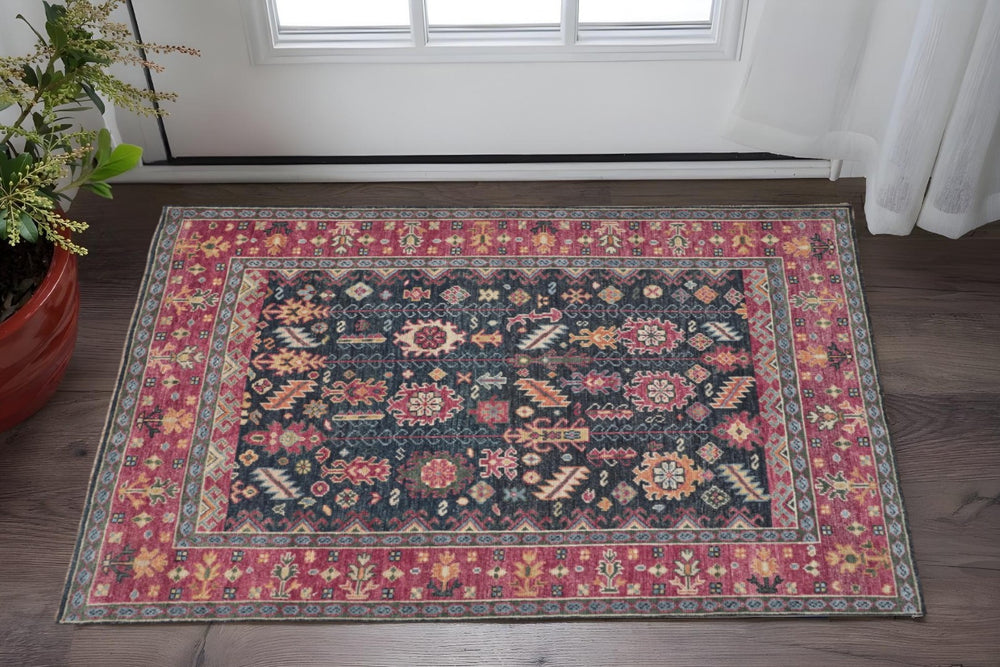 HomeRoots 4' Artisan Hand-Knotted Wool Tribal Area Rug in Dark Pink, Blue, and Black with Distressed Fringe Decor 2' X 3' 511649