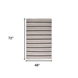Homeroots 4' X 6' Black And White Striped Dhurrie Hand Woven Stain Resistant Area Rug Black,White Other Material 511657