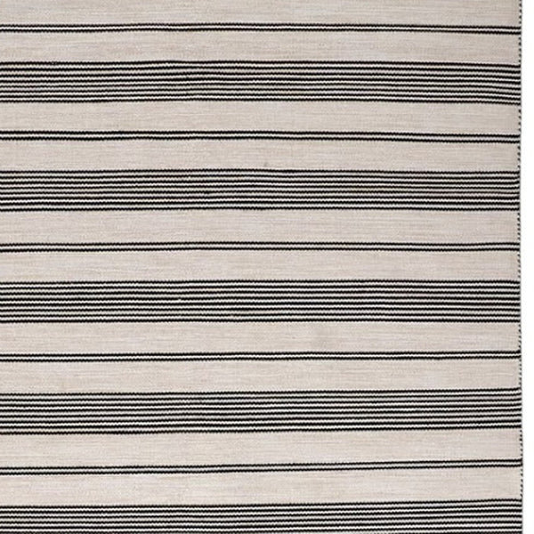 HomeRoots 4' Hand Woven Black and White Striped Area Rug - Eco-Friendly, Durable, and Stylish for Any Room 4' X 6' 511657