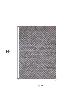 HomeRoots 5' Contemporary Gray and Silver Abstract Area Rug - Durable, Stain-Resistant Design for Modern Spaces 5' X 8' 511771