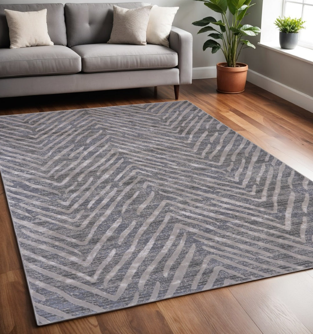 HomeRoots 5' Contemporary Gray and Silver Abstract Area Rug - Durable, Stain-Resistant Design for Modern Spaces 5' X 8' 511771