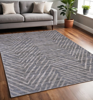 HomeRoots 5' Contemporary Gray and Silver Abstract Area Rug - Durable, Stain-Resistant Design for Modern Spaces 5' X 8' 511771