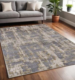 HomeRoots 5' Gray and Gold Abstract Area Rug - Modern Contemporary Design for Living Rooms and High-Traffic Spaces 5' X 8' 511778