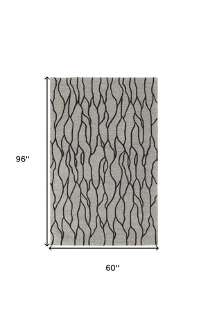 Homeroots 5' X 8' Taupe Black And Gray Wool Abstract Tufted Handmade Stain Resistant Area Rug Taupe,Black,Gray Wool 511845