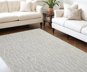 Homeroots 10' X 13' Taupe And Ivory Wool Abstract Tufted Handmade Stain Resistant Area Rug Taupe,Ivory Wool 511853