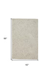 Homeroots 4' X 6' Tan And Ivory Wool Geometric Tufted Handmade Stain Resistant Area Rug  Wool 511862