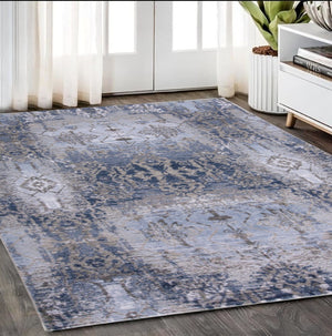 HomeRoots 5' Abstract Blue-Gray and Taupe Area Rug - Stain-Resistant, Durable Design for Modern Spaces 5' X 7' 511880