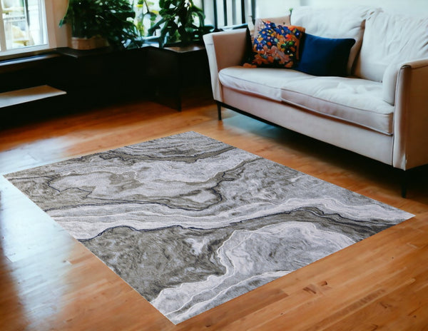 HomeRoots 5' Contemporary Ivory Blue and Gray Abstract Area Rug - Soft, Durable, Stain-Resistant Design for Homes 5' X 7' 511904