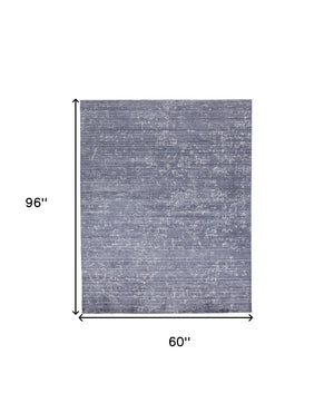 HomeRoots 5' Hand-Woven Blue and Ivory Abstract Area Rug - Contemporary Artistry for Modern Living Spaces 5' X 8' 511911