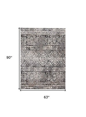 Homeroots 4' Stylish Gray Ivory Taupe Abstract Stain Resistant Area Rug - Perfect For Homes With Kids & Pets 5' X 8' Polypropylene 512058