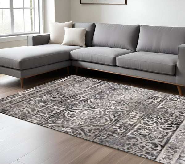 HomeRoots 4' Modern Abstract Stain-Resistant Area Rug in Gray, Ivory & Taupe - Perfect for High-Traffic Homes! 7' X 10' 512059