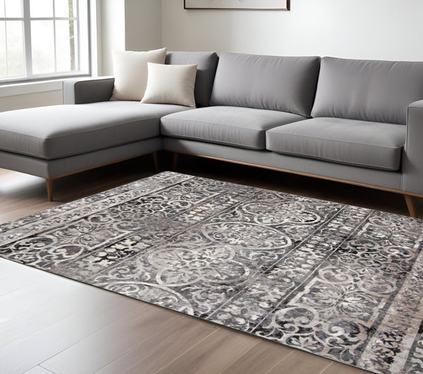 Homeroots 4' Stylish Gray Ivory Taupe Abstract Stain Resistant Area Rug - Perfect For Homes With Kids & Pets 10' X 14' Polypropylene 512061