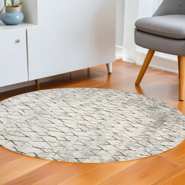Homeroots 9' Ivory Gray And Taupe Round Abstract Stain Resistant Area Rug  Polypropylene 512070