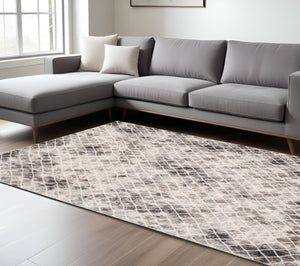 HomeRoots 4' Ivory Gray Taupe Abstract Area Rug - Stain Resistant, Modern Design for High-Traffic Spaces 7' X 10' 512073