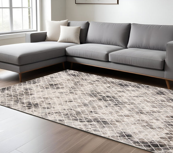 HomeRoots 4' Ivory Gray Taupe Abstract Area Rug - Stain Resistant, Modern Design for High-Traffic Spaces 7' X 10' 512073