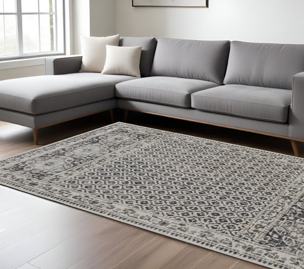 HomeRoots 4' Abstract Area Rug in Ivory, Taupe & Gray - Stain-Resistant, Modern Design for Durable Elegance 7' X 10' 512080