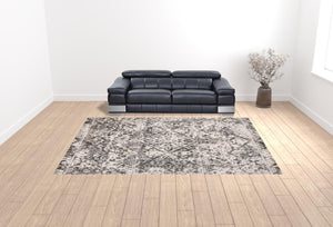 HomeRoots 10' Gray Ivory and Silver Abstract Area Rug – Stain Resistant, Soft Low Pile for Modern Interiors 10' X 14' 512096
