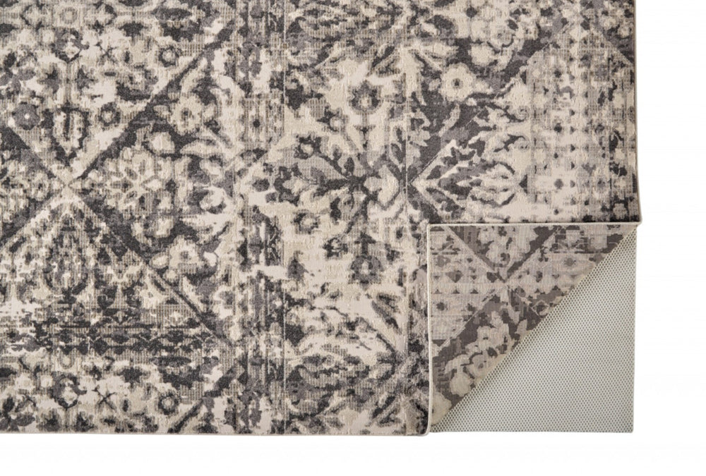 HomeRoots 10' Gray Ivory and Silver Abstract Area Rug – Stain Resistant, Soft Low Pile for Modern Interiors 10' X 14' 512096