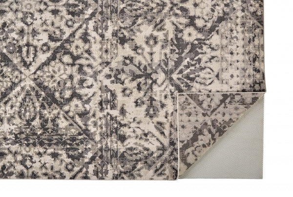 HomeRoots 10' Gray Ivory and Silver Abstract Area Rug – Stain Resistant, Soft Low Pile for Modern Interiors 10' X 14' 512096