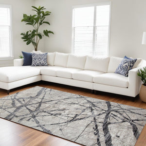 HomeRoots 4' Taupe Gray and Ivory Abstract Area Rug - Durable, Stain-Resistant Design for Modern Spaces 8' X 11' 512102