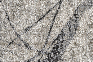 HomeRoots 4' Taupe Gray and Ivory Abstract Area Rug - Durable, Stain-Resistant Design for Modern Spaces 9' Round 512105