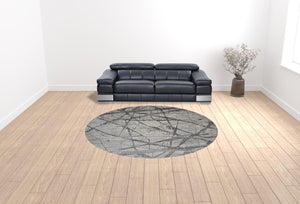 HomeRoots 4' Taupe Gray and Ivory Abstract Area Rug - Durable, Stain-Resistant Design for Modern Spaces 9' Round 512105