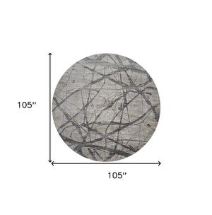HomeRoots 4' Taupe Gray and Ivory Abstract Area Rug - Durable, Stain-Resistant Design for Modern Spaces 9' Round 512105