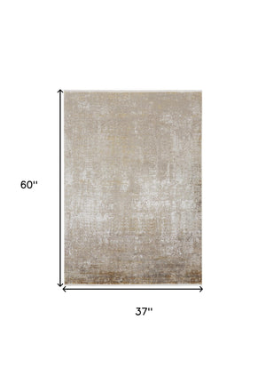 Homeroots 3' X 5' Gold And Ivory Abstract Power Loom Distressed Area Rug With Fringe Taupe,Ivory,Gold Viscose 512106