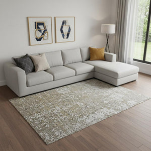 HomeRoots 3' Gold and Ivory Abstract Area Rug - Distressed Design with Decorative Fringe for Stylish Interiors 7' X 10' 512108