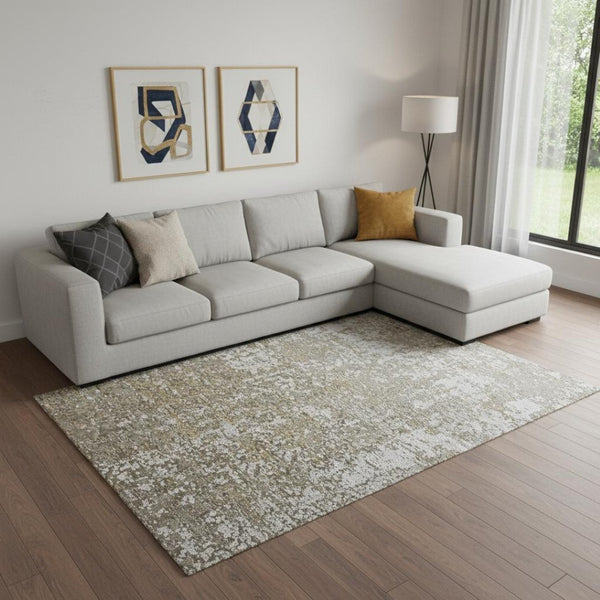 HomeRoots 3' Gold and Ivory Abstract Area Rug - Distressed Design with Decorative Fringe for Stylish Interiors 7' X 10' 512108