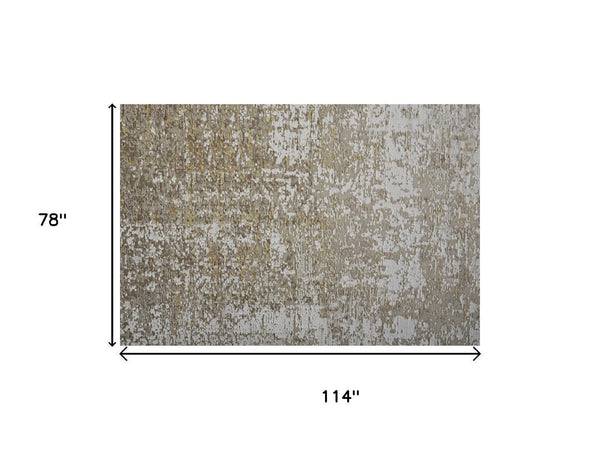 HomeRoots 3' Gold and Ivory Abstract Area Rug - Distressed Design with Decorative Fringe for Stylish Interiors 7' X 10' 512108