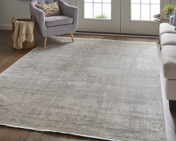 Homeroots 3' X 5' Tan And Ivory Abstract Power Loom Distressed Area Rug With Fringe Tan,Ivory,Gray Viscose 512116