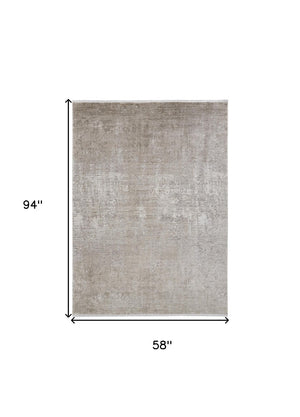 HomeRoots 3' Gold and Ivory Abstract Area Rug - Distressed Design with Decorative Fringe for Stylish Interiors 5' X 8' 512117