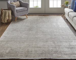 HomeRoots 3' Gold and Ivory Abstract Area Rug - Distressed Design with Decorative Fringe for Stylish Interiors 7' X 10' 512118