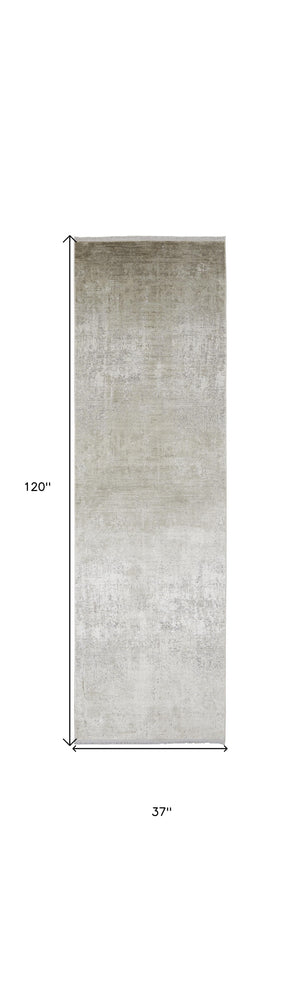 Homeroots 10' Tan And Ivory Abstract Power Loom Distressed Runner Rug With Fringe Tan,Ivory,Gray Viscose 512121