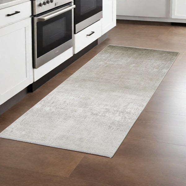 Homeroots 10' Tan And Ivory Abstract Power Loom Distressed Runner Rug With Fringe Tan,Ivory,Gray Viscose 512121