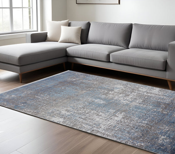 Homeroots 7' X 10' Blue And Gray Abstract Power Loom Distressed Area Rug With Fringe Blue,Gray,Silver Viscose 512128