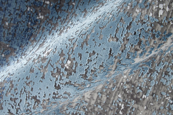 Homeroots 2' X 3' Blue And Gray Abstract Power Loom Distressed Area Rug With Fringe Blue,Gray,Silver Viscose 512135