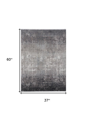 Homeroots 3' X 5' Gray And Black Abstract Power Loom Distressed Area Rug With Fringe Gray,Black,Silver Viscose 512136