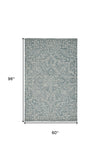 Homeroots 5' X 8' Blue Ivory And Green Wool Floral Tufted Handmade Stain Resistant Area Rug Blue,Ivory,Green Wool 512224