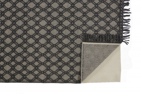 HomeRoots 5' Black and Ivory Hand-Woven Wool Area Rug with Geometric Design and Fringed Edges for Sophistication 5' X 8' 512360